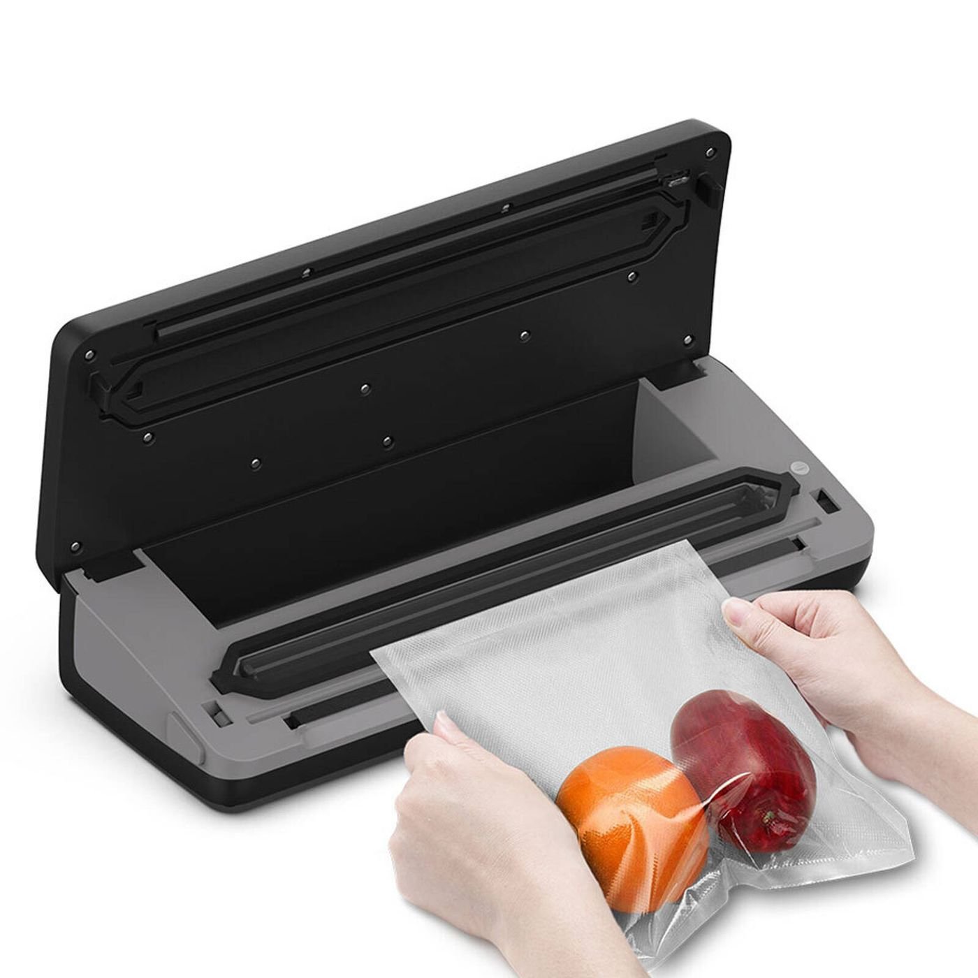 Vacuum Sealer in use with fruits, showing the process of sealing food in a bag for freshness preservation.